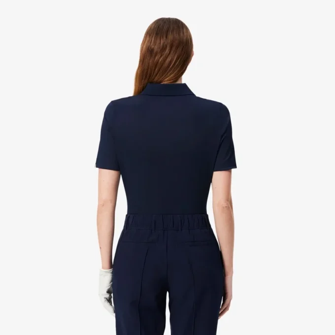Polo de golfe feminino slim fit com proteção UV e tecido elástico
