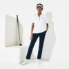 Polo de golfe feminino slim fit com proteção UV e tecido elástico
