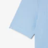 Polo de golfe feminino slim fit com proteção UV e tecido elástico