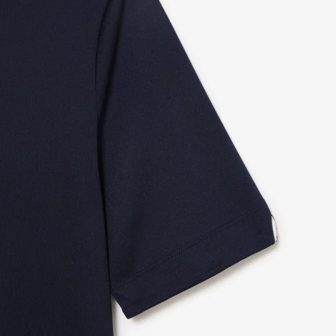 Polo de golfe feminino slim fit com proteção UV e tecido elástico