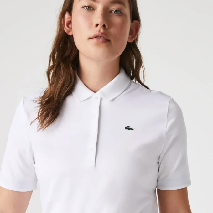 Polo de golfe feminino slim fit com proteção UV e tecido elástico
