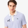 Polo de golfe às riscas com termorregulação para homem