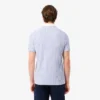 Polo de golfe às riscas com termorregulação para homem