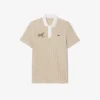 Polo de golfe às riscas com termorregulação para homem