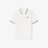 Polo de ténis com gola às riscas e proteção UV para mulher