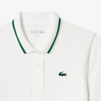 Polo de ténis com gola às riscas e proteção UV para mulher