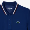 Polo de ténis com gola às riscas e proteção UV para mulher