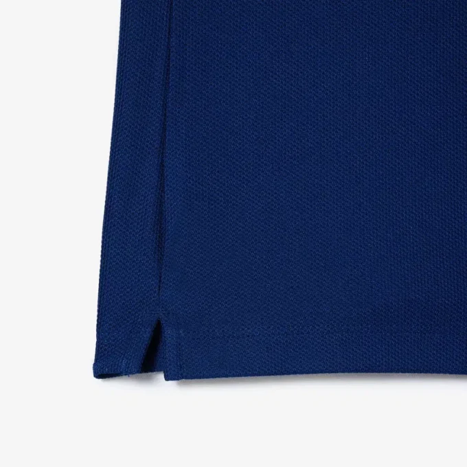 Polo de ténis com gola às riscas e proteção UV para mulher