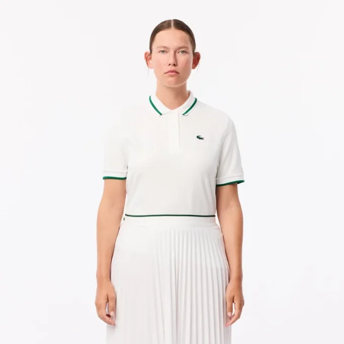 Polo de ténis com gola às riscas e proteção UV para mulher