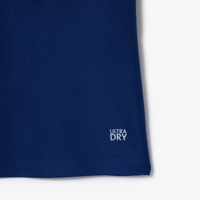 Polo de ténis com gola às riscas e proteção UV para mulher
