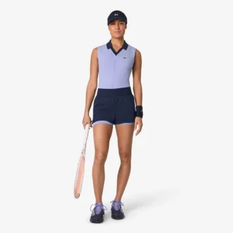Polo de ténis sem mangas em malha elástica para mulher