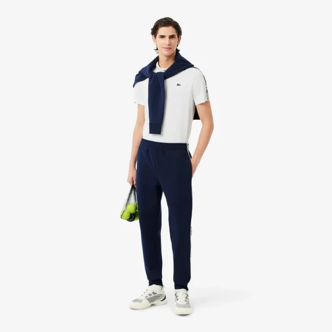 Polo de ténis Ultra Dry com riscas da marca para homem
