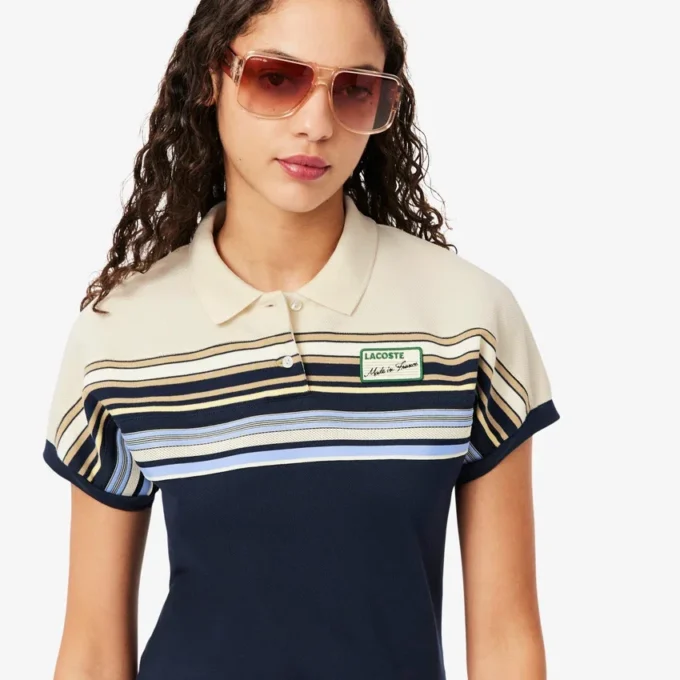 Polo feminino com riscas, corte justo, fabricado em França