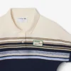Polo feminino com riscas, corte justo, fabricado em França