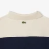 Polo feminino com riscas, corte justo, fabricado em França