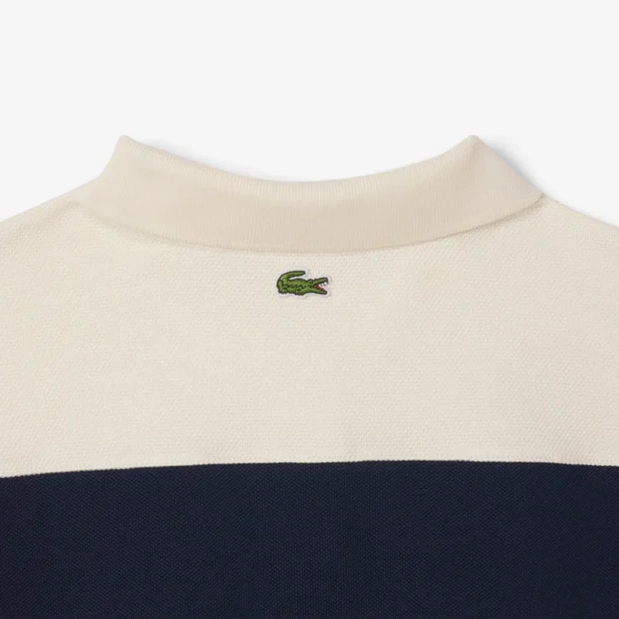 Polo feminino com riscas, corte justo, fabricado em França