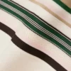 Polo feminino com riscas, corte justo, fabricado em França