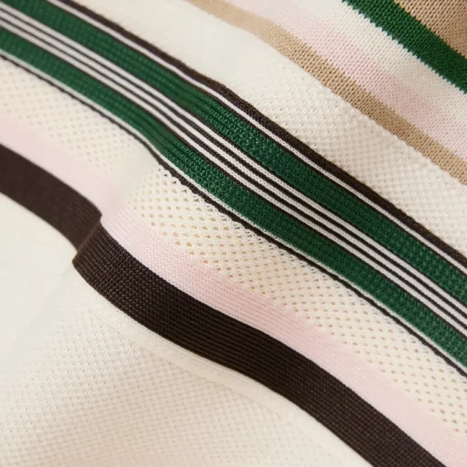 Polo feminino com riscas, corte justo, fabricado em França