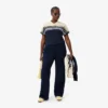 Polo feminino com riscas, corte justo, fabricado em França