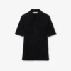 Polo feminino de malha canelada felpuda com corte justo