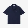 Polo feminino de malha piqué com corte descontraído