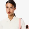 Polo feminino em malha canelada 3D