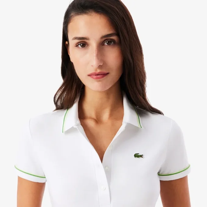 Polo feminino L.12.D de corte justo com detalhes de acabamento