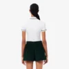 Polo feminino L.12.D de corte justo com detalhes de acabamento