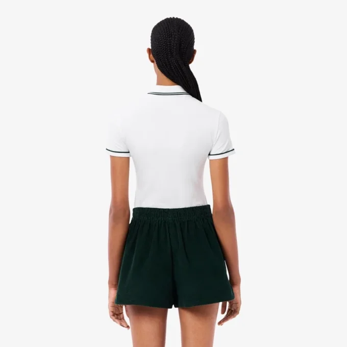 Polo feminino L.12.D de corte justo com detalhes de acabamento