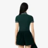 Polo feminino L.12.D de corte justo com detalhes de acabamento