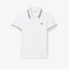Polo feminino L.12.D de corte justo com detalhes de acabamento
