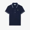 Polo feminino L.12.D de corte justo com detalhes de acabamento