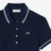 Polo feminino L.12.D de corte justo com detalhes de acabamento