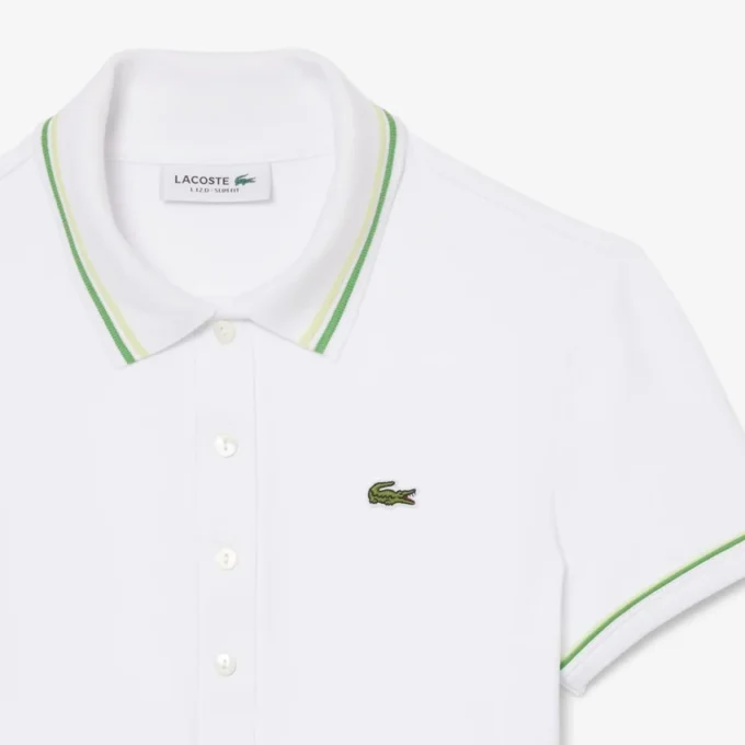 Polo feminino L.12.D de corte justo com detalhes de acabamento