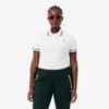 Polo feminino L.12.D de corte justo com detalhes de acabamento