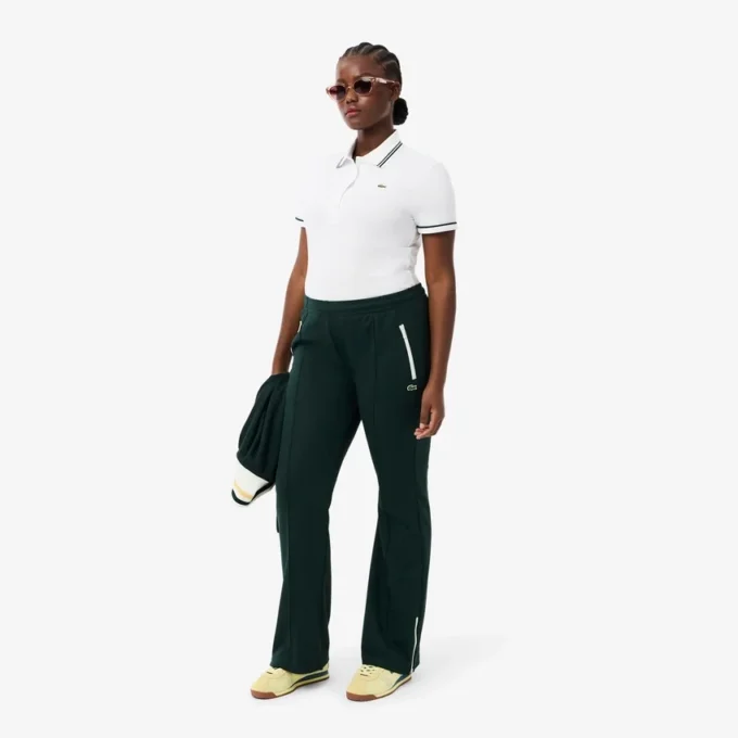 Polo feminino L.12.D de corte justo com detalhes de acabamento