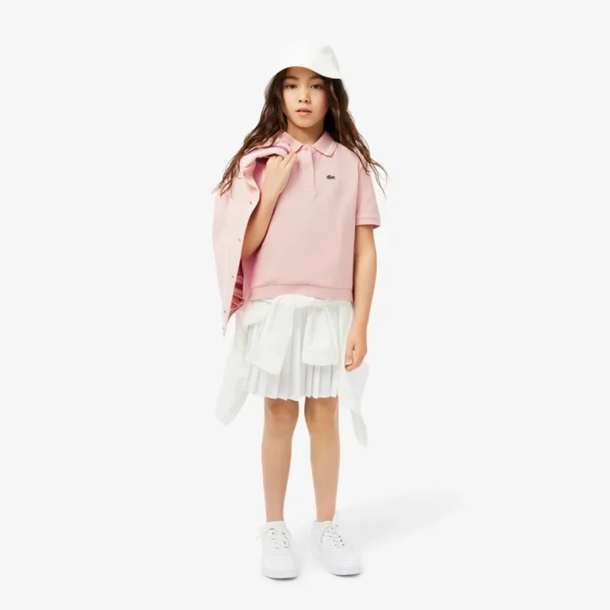 Polo infantil Petit Piqué com pregas nas costas