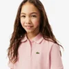 Polo infantil Petit Piqué com pregas nas costas