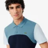 Polo L.12.12 com blocos de cor, corte regular, para homem