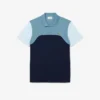 Polo L.12.12 com blocos de cor, corte regular, para homem