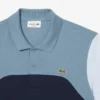 Polo L.12.12 com blocos de cor, corte regular, para homem