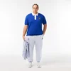 Polo L.12.12 com emblema, corte clássico para homem