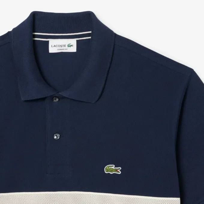 Polo L.12.12 de corte clássico com riscas arrojadas para homem