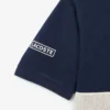 Polo L.12.12 de corte clássico com riscas arrojadas para homem