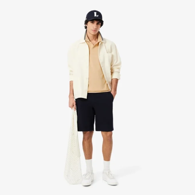 Polo L.12.12 para homem, corte regular com detalhes