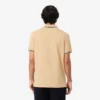 Polo L.12.12 para homem, corte regular com detalhes