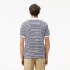 Polo L.12.12 às riscas em malha Petit Piqué de corte clássico para homem