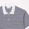 Polo L.12.12 às riscas em malha Petit Piqué de corte clássico para homem