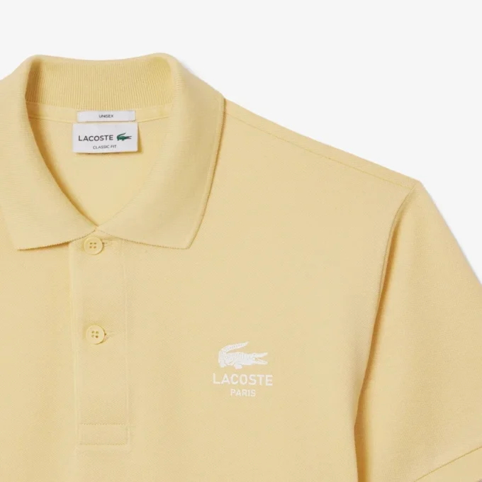 Polo L.12.12 unissexo de corte clássico com estampado exclusivo