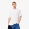 Polo masculino de corte largo em piqué pesado